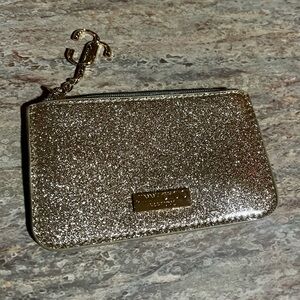 NWOT Jimmy Choo zip Wristlet with Gold Logo Plaque